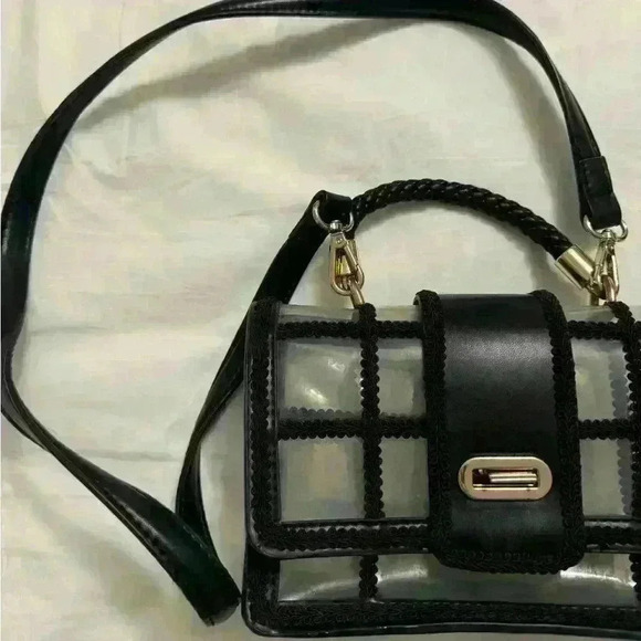 Woman’s clear black purse with gold accents - Picture 2 of 5